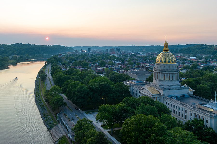Charleston, WV - Sunset Over West Virginia State Capitol and Kanawha River